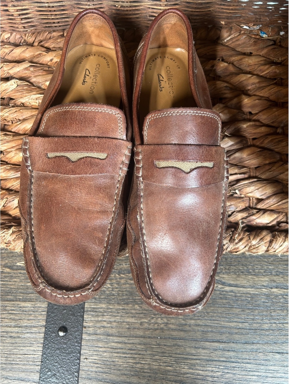 Brown penny loafer slip-on shoes